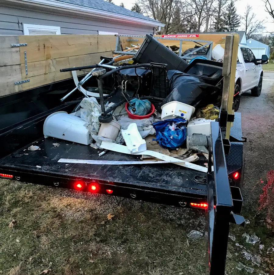Roll-off dumpster delivered to a residential driveway in Augusta
